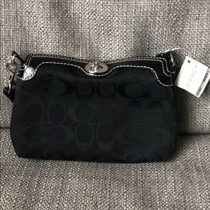 Coach turnlock wristlet